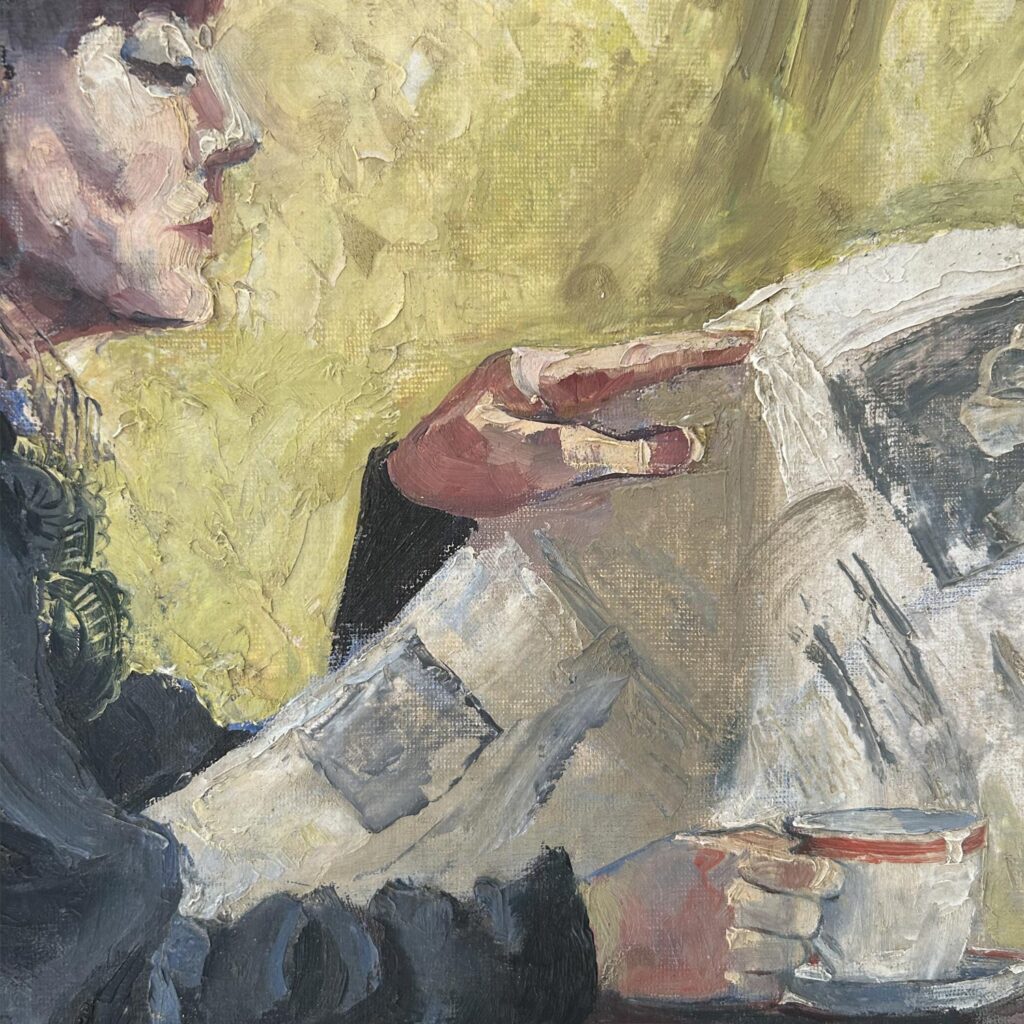 Woman reading a newspaper